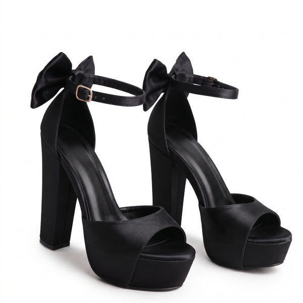ZAPATILLA ELEGANTE NEGRA CON TACÓN GRUESO Y MOÑO (MOD 7145)